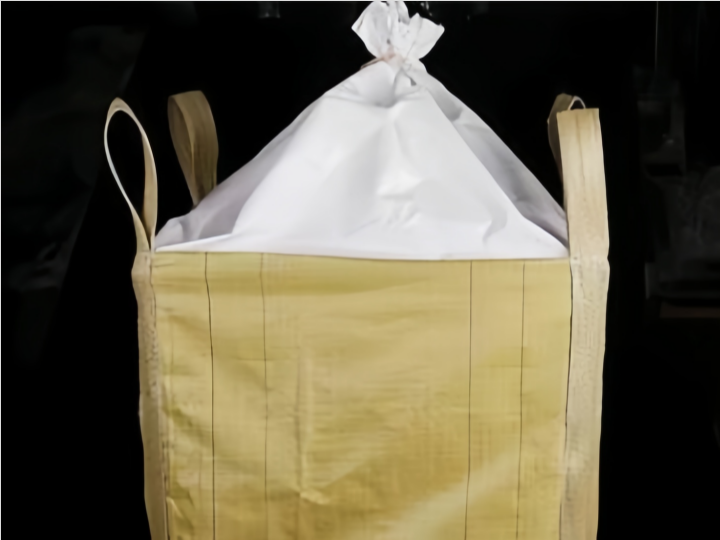 The material of the yellow large cloth bag is typically made of a durable and sturdy fabric such as canvas, nylon, or polyester.